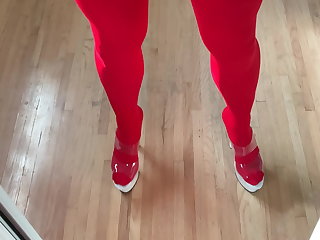Mirror cum in red tights, stockings and heels